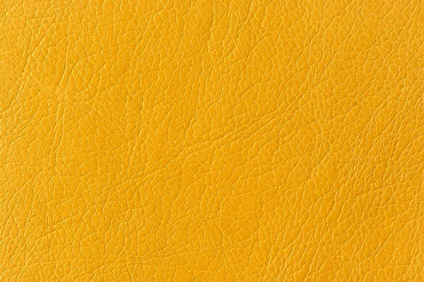 Textura de fundo de couro artificial amarelo — Fotografia de Stock