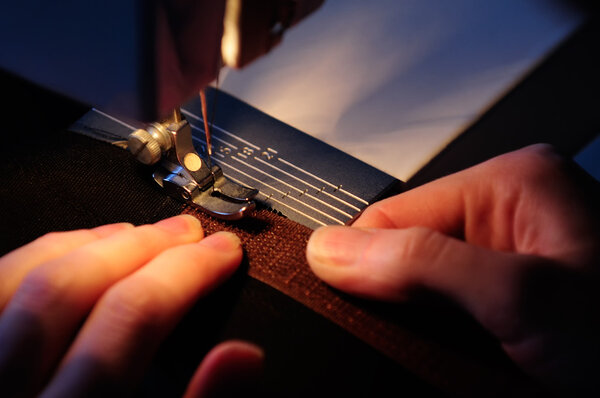 Seamstress Sewing on Velcro Hook-And-Loop Fastener