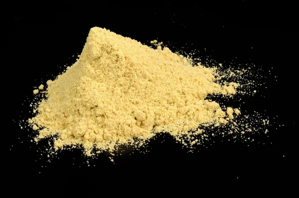 Mustard Powder on Black Background — Stock Photo, Image