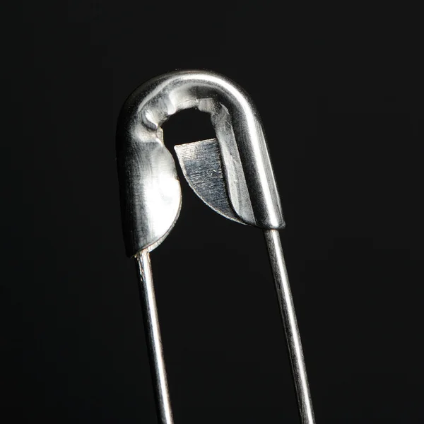 Safety Pin on Black Background — Stock Photo, Image