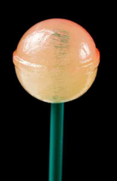 Lollipop close-up em fundo preto — Fotografia de Stock