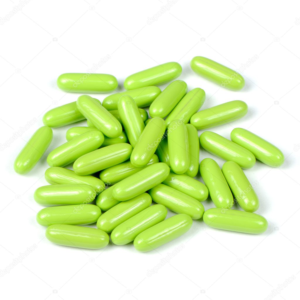 Green Pills (Capsules) Isolated on White Background