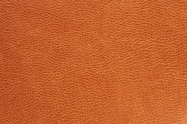 Textura de fundo de couro artificial brilhante laranja — Fotografia de Stock
