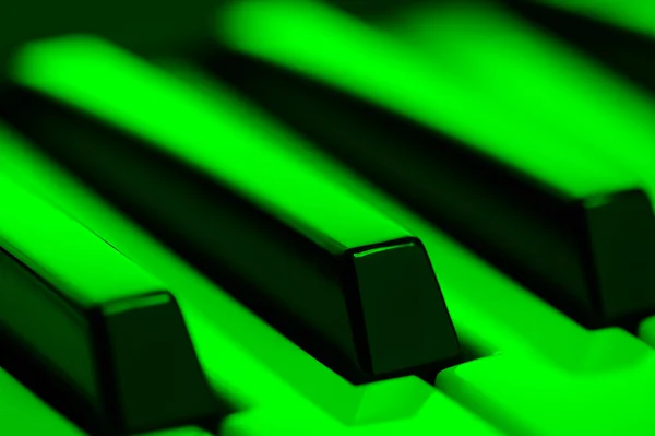 Piano Keys in Green Light — Stock Photo, Image