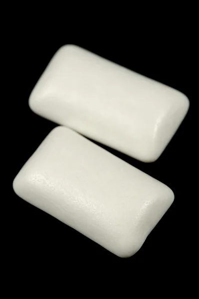Žvýkačky pelety izolovaných na černém pozadí — Stock fotografie