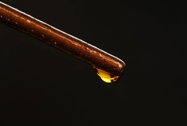 Drop of Essential Oil on Dark Background — Stock Photo, Image