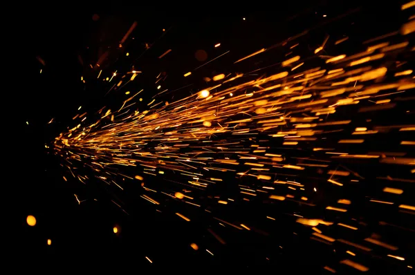 Glowing Flow of Sparks in the Dark — Stock Photo, Image