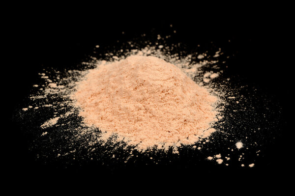 Loose Face Powder on Black Background