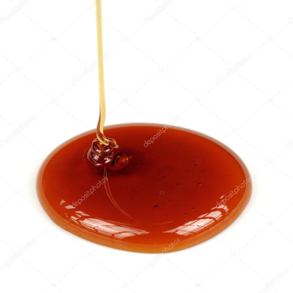 Dripping Honey on White Background