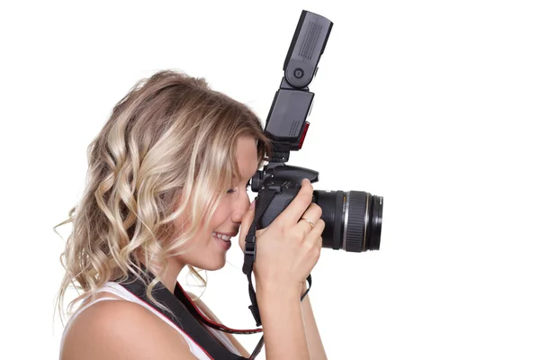 Woman shooting with a camera — Stock Photo, Image