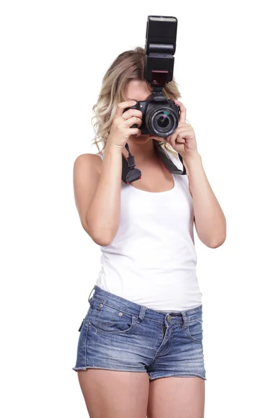 Mulher atirando com uma câmera — Fotografia de Stock