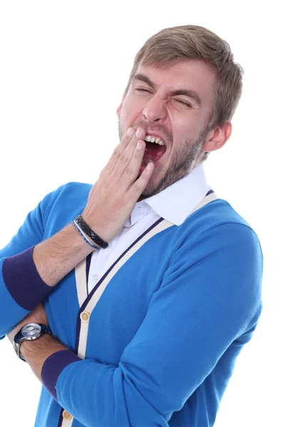 Portret van jonge man geeuwen geïsoleerd — Stockfoto