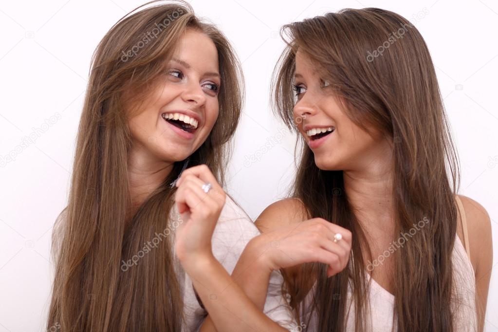 two young women - isolated on white