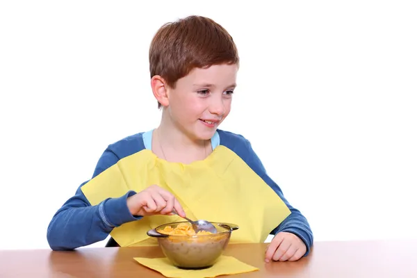 Little boy breakfast isolated over white background — Stock Photo, Image