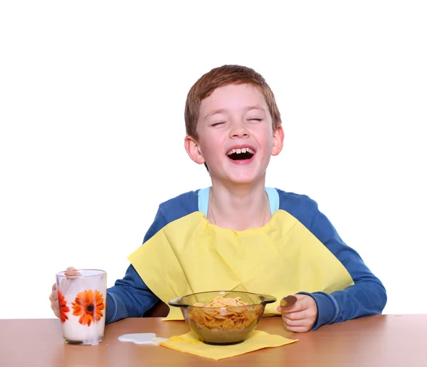 Little boy breakfast isolated over white background — Stock Photo, Image