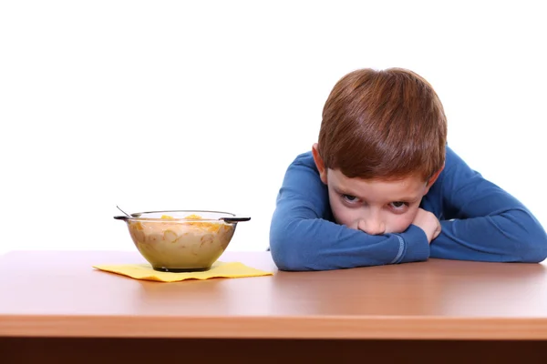 Little boy breakfast isolated over white background — Stock Photo, Image