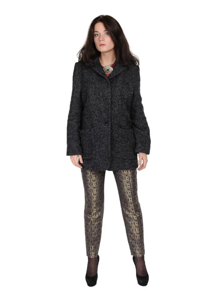 Модный портрет девушки в брюках и осеннем пальто — стоковое фото