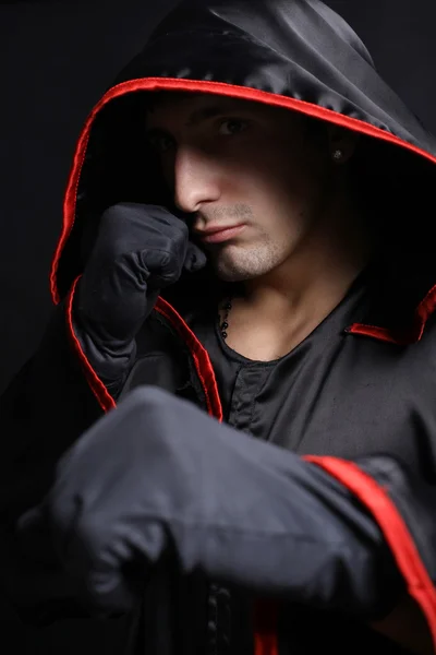 Young man in a monks robe — Stock Photo, Image