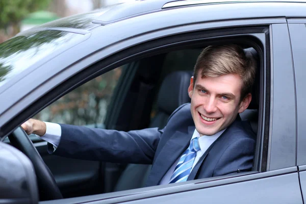 Young attractive man young man in the car — Stock Photo, Image