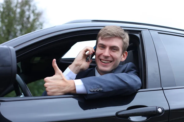 Young attractive man calling by phone — Stock Photo, Image