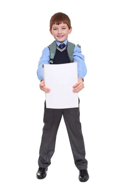 Portret van een schooljongen geïsoleerd op witte achtergrond — Stockfoto