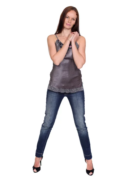 Schöne junge Frau in blauen Jeans — Stockfoto