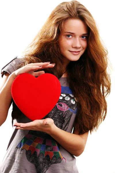 Young woman holding a heart — Stock Photo, Image