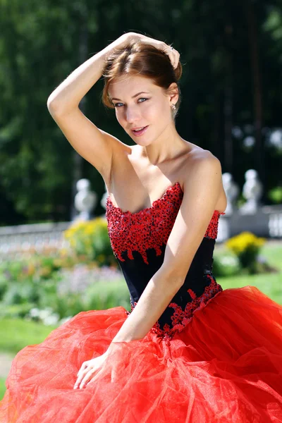 Beautiful young women in Red dress — Stock Photo, Image