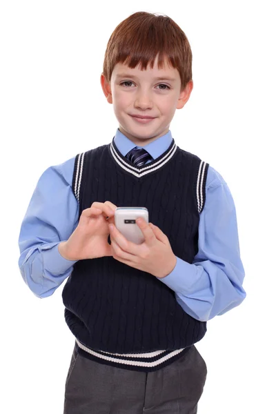 Liten pojke ringer via telefon — Stockfoto
