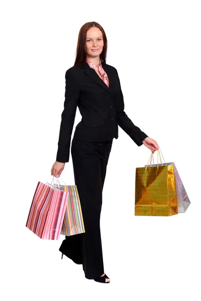 Vacker kvinna med shoppingväskor — Stockfoto