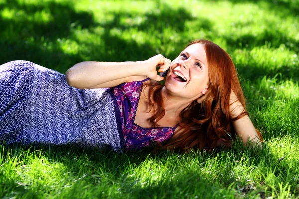 Young woman calling by phone — Stock Photo, Image