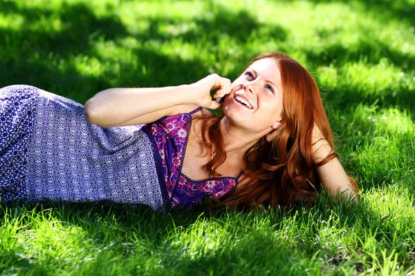 Young woman calling by phone — Stock Photo, Image