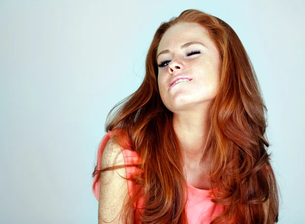 Young beautiful woman in studio — Stock Photo, Image