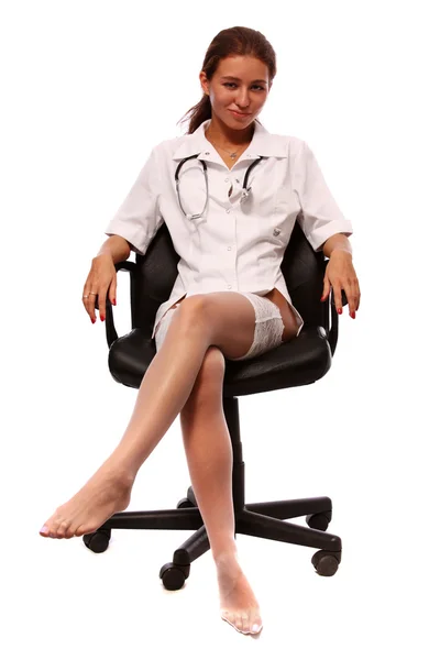 Young sexy woman dressed as a nurse — Stock Photo, Image