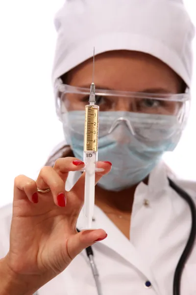 Young female Hispanic nurse in a lab coat — Stock Photo, Image