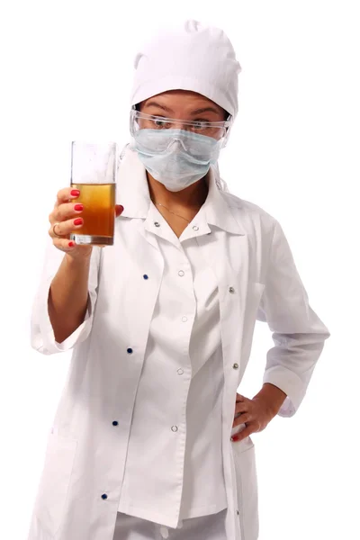 Young female Hispanic nurse in a lab coat — Stock Photo, Image