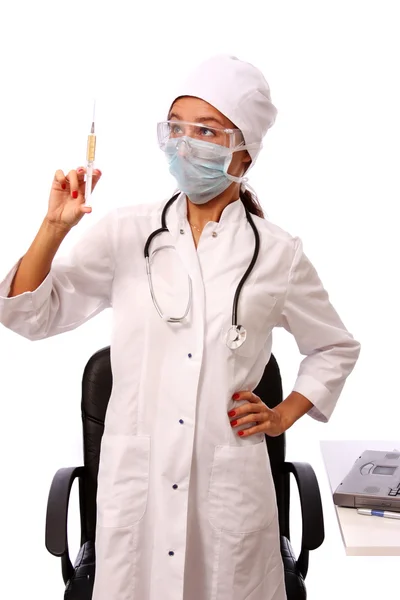 Young female Hispanic nurse in a lab coat — Stock Photo, Image