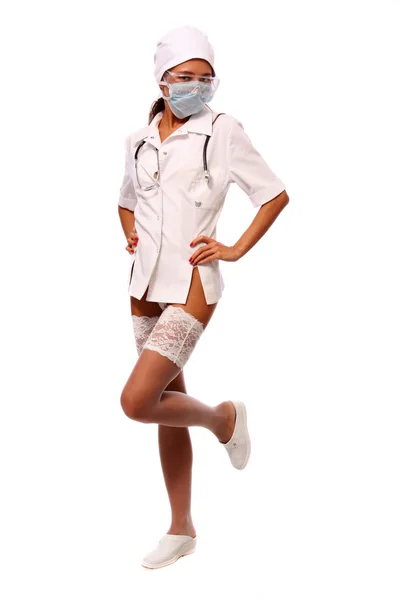 Молода сексуальна жінка, одягнена як медсестра — стокове фото