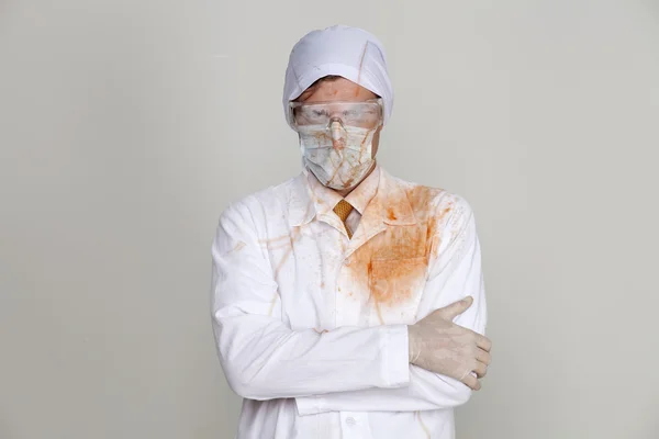 Doctor in a bloody robe — Stock Photo, Image