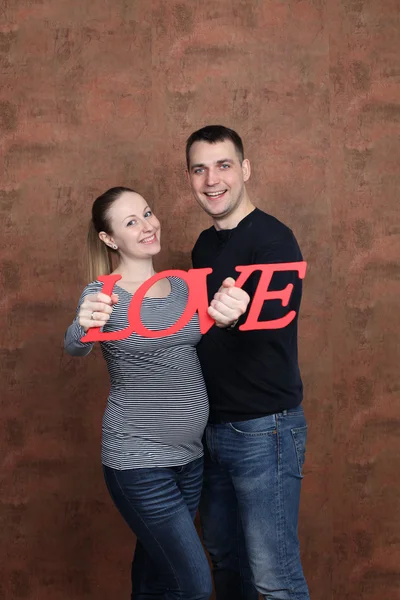 Jovem casal família grávida — Fotografia de Stock