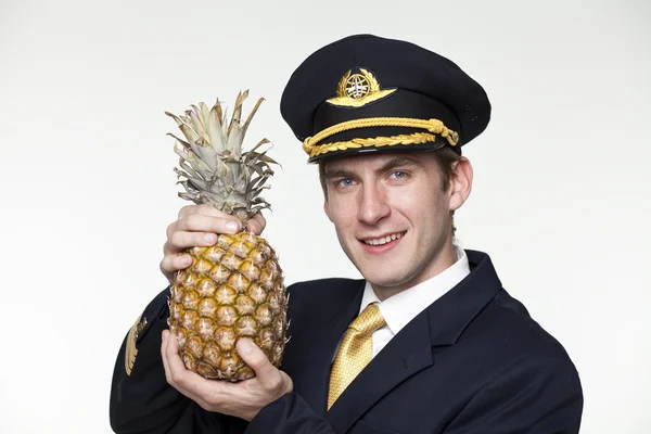 Young man in the form of a passenger plane pilot — Stock Photo, Image