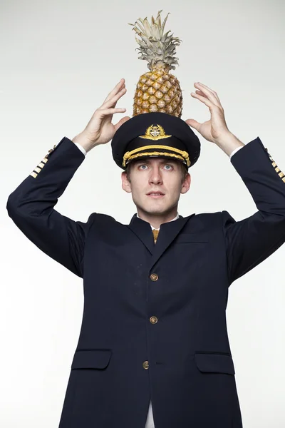 Young man in the form of a passenger plane pilot — Stock Photo, Image