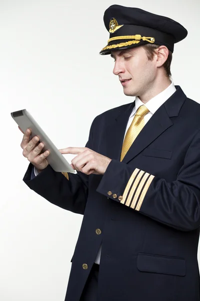 Young man in the form of a passenger plane pilot — Stock Photo, Image
