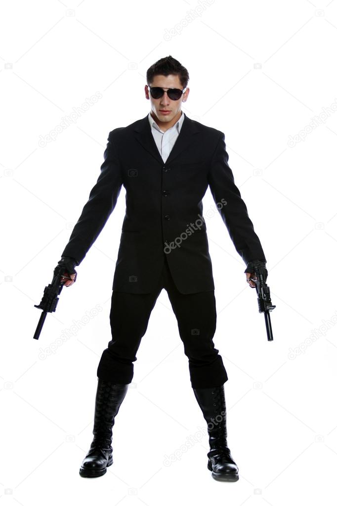 Men in black suit holding gun