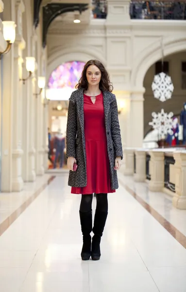 Young beautiful woman in red dress — Stock Photo, Image