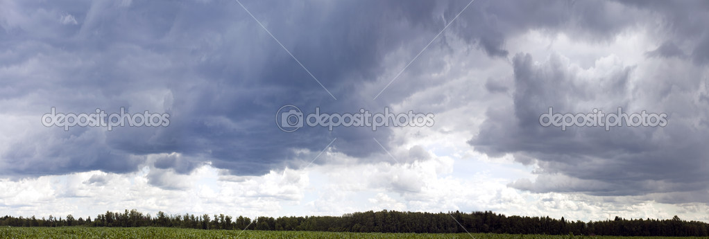 Blue sky background with gray clouds