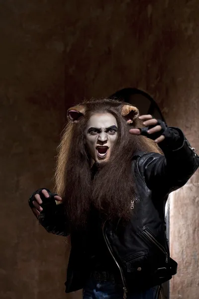 Male face of a Lion man in dark — Stock Photo, Image