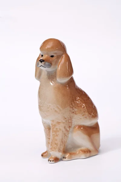 Poedel hond keramische beeldje — Stockfoto