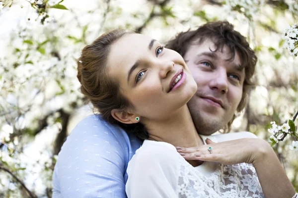 Embracing couple in spring nature closeup portrait — Stock Photo, Image