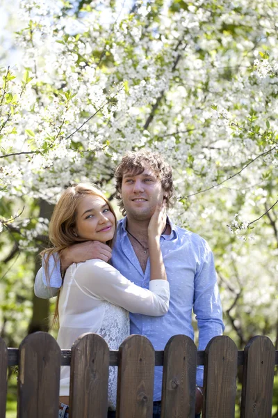 Embracing couple in spring nature closeup portrait — Stock Photo, Image